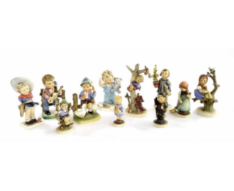 Collection of eight Goebel Hummel figures of children; together with three other similar style figures (11)