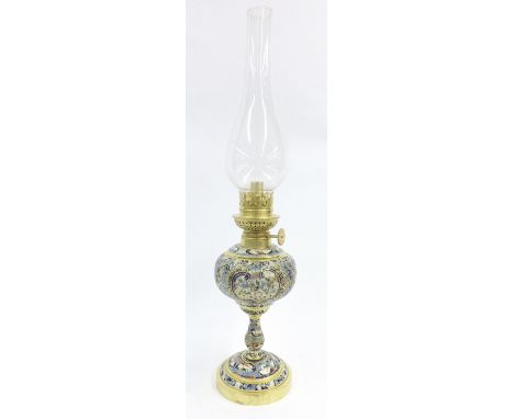 Contemporary cloisonne and brass oil lamp, the glass chimney supported upon a spherical reservoir, baluster column and circul