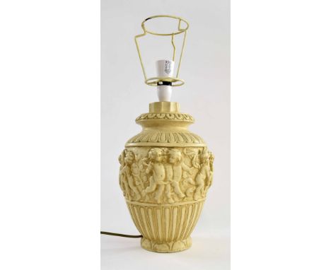 Decorative moulded plaster table lamp, decorated with a band of cherubs, base 12.5" high