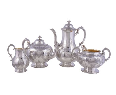 Ω A matched Victorian silver four piece baluster tea and coffee service, the tea pot and sugar basin by Henry Holland, London