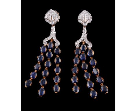  A pair of sapphire and diamond earrings,   the chandelier style earpendants set with oval cut sapphires suspended below a br