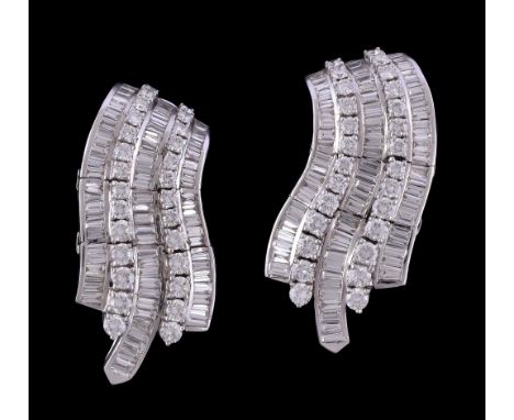  A pair of diamond earrings,   the curved panels set with brilliant cut and baguette cut diamonds, approximately 14.00 carats