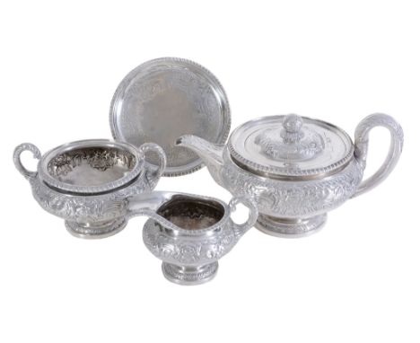 Ω A late George III Scottish silver four piece circular pedestal tea service by Robert Gray & Son of Glasgow, Edinburgh 1816,