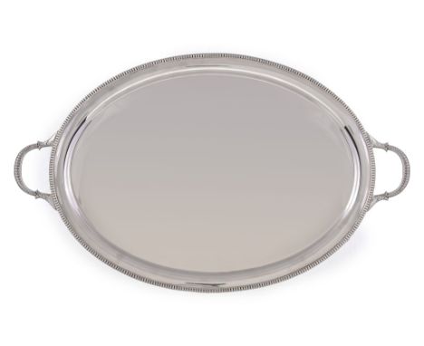 A silver oval twin handled tray by William Hutton  &  Sons Ltd,   Sheffield 1923, with a raised nulled rim, the conforming l