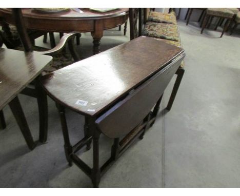 An oak gate leg table