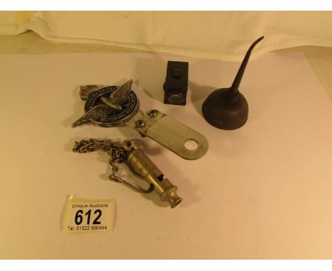 A Civil Service Motoring Association car badge, a Hull constabulary police whistle, an oil can and one other item