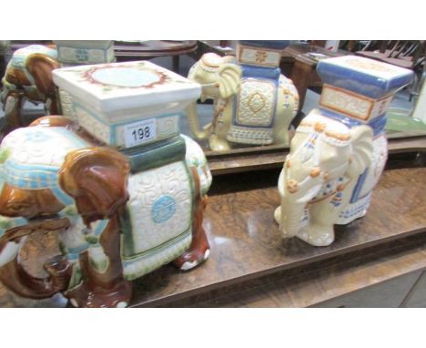 2 ceramic elephant plant stands