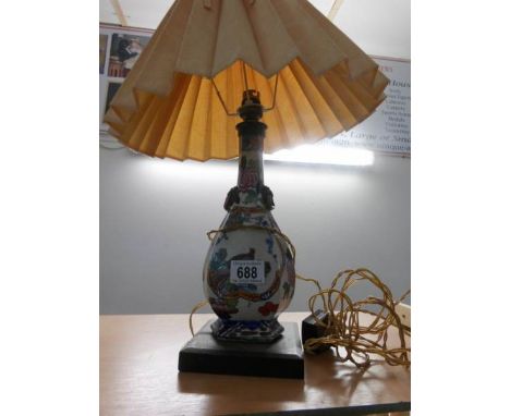 An oriental (possibly Japanese) vase converted in to a table lamp