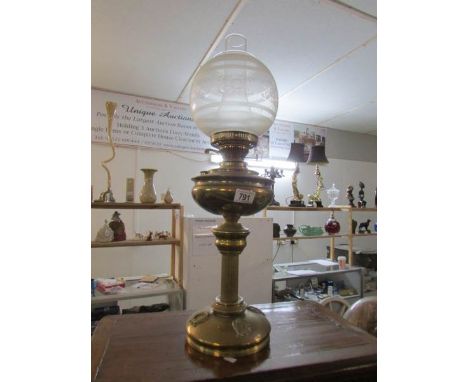 A brass oil lamp