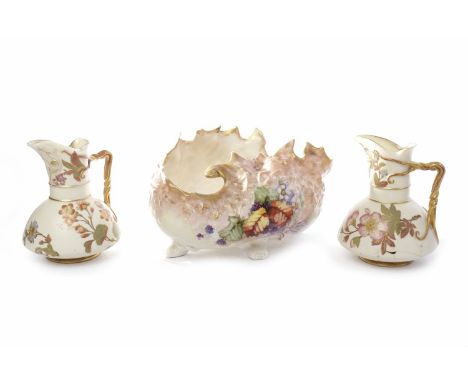 NAUTILUS PORCELAIN COMPORTmodelled in the form of a shell, painted with fruiting and leaf motifs and on a blush pink and crea