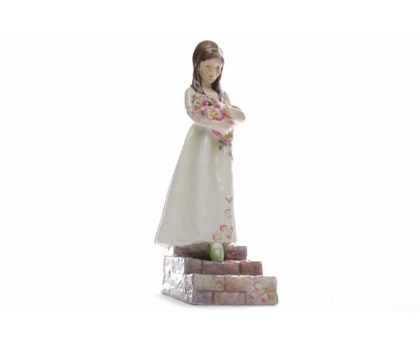 ROYAL WORCESTER FIGURE OF THE BRIDESMAIDmodelled by F G Doughty, shape number 3224, hand-painted and puce printed marks to ba