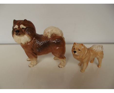 Two ceramic dogs, largest 19cm 