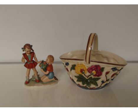 Goebel figure group together with an Indian Tree pattern basket 