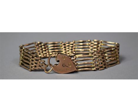 A 9ct Gold Six Row Gate Bracelet with Heart Shaped Padlock Clasp, 21.6 gms 