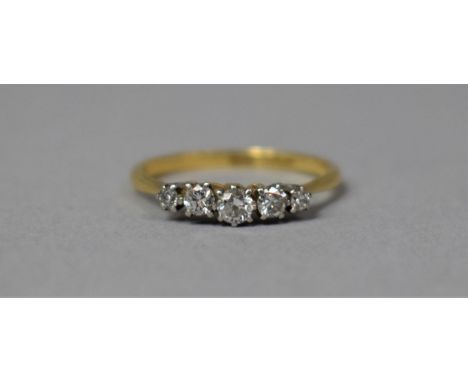 An 18ct Gold, Platinum and Diamond Ring, Having Five Stones, Larger Stone 1/8th Carat, Size K 