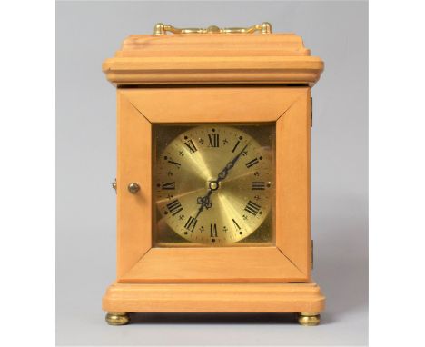 A Modern Brass Mounted Carriage Clock with Battery Movement, 26cm high 