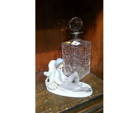 Decanter and a Lladro figure 