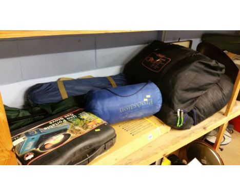 Shelf of camping accessories, tent, cooker etc.