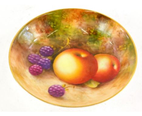 A Royal Worcester porcelain pin tray, painted with fruit, signed Roberts, printed mark in black to underside, 10cm diameter.
