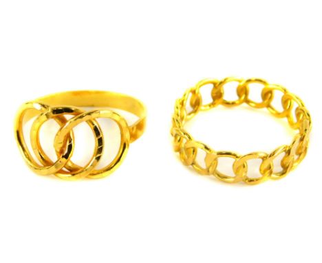 Two dress rings, to include a knot weave ring, ring size R, stamped Italy, and a further chain design dress ring, yellow meta