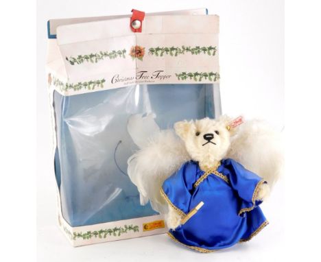 A Steiff Christmas tree topper bear, in original box, labelled Steiff North American exclusive.