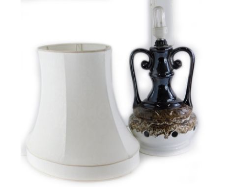 A German 1970s/80s retro style pottery two handled table lamp, with later shade, 84cm high overall.