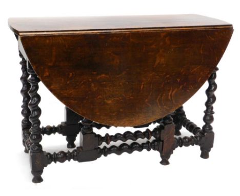 An early 18thC oak gateleg table, an oval top on spirally turned supports, with spiral and bobbin turned stretchers, 72cm hig