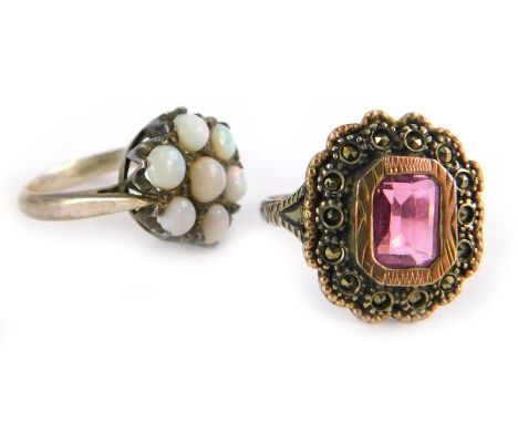 Two silver dress rings, to include an opal floral cluster ring, ring size L, and a 9ct gold and silver garnet and marcasite d