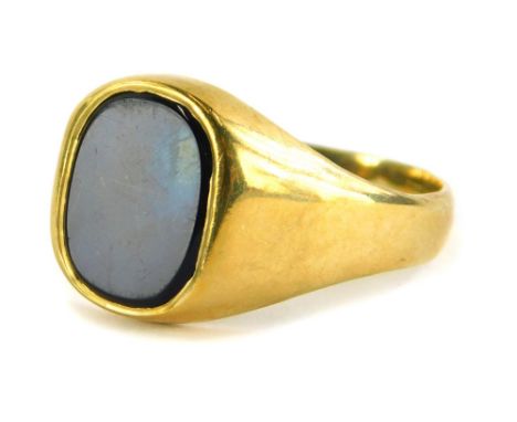 A 9ct gold gents signet ring, set with oval black agate, on a rectangular ring head, on a plain band, ring size W, Birmingham