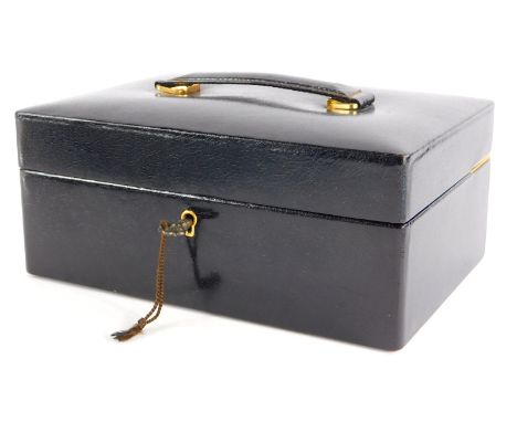 A brown leather Asprey London jewellery box, the box with key lock, metal hinges, single shelf with two lift up compartments,