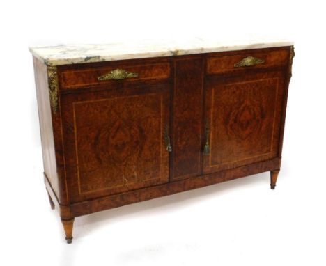 An early 20thC French burr yew side cabinet, the top with a variegated marble top, above two frieze drawers, each with leaf c