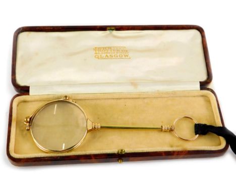 A gilt brass lorgnette, in fitted case stamped John Trotter Limited, Glasgow.