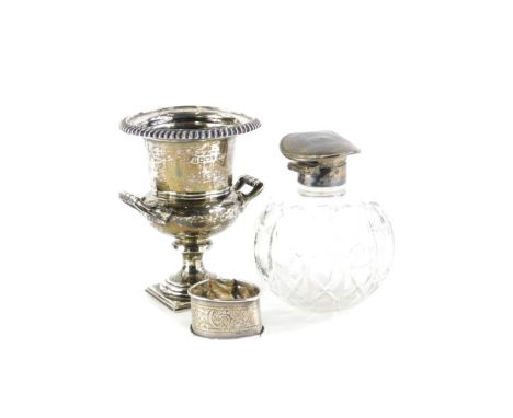 A George V two handled silver campana shaped urn, with a gadrooned border and a square base, Birmingham 1910, 4¼oz, 12cm high