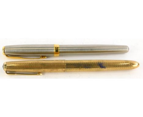 A Parker fountain pen, with a 9ct gold engine turned case, and a Parker Sonnet fountain pen. (2)