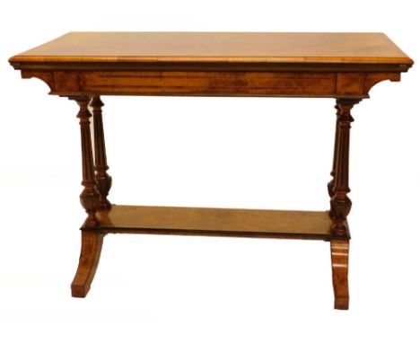 A Victorian exhibition quality figured walnut card table, the rectangular top with a moulded edge enclosing a baize and black