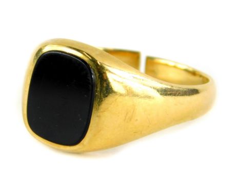 A 9ct gold signet ring, with a rectangular black onyx set panel, Sheffield 1921, cut, ring size R, 5.6g.