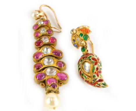 Two Indian single earrings, to include a silver gilt, set with white sapphire and later replacement paste stones, garnets and