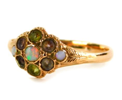 A 9ct gold Victorian style dress ring, the central floral cluster set with peridot, amethyst and opals, with fern splayed sho