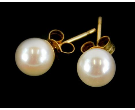 A pair of 9ct gold and cultured pearl stud earrings, each with butterfly backs.