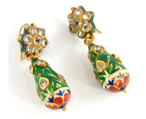 A pair of diamond and enamel drop earrings, the top in the form of a floral cluster set with seven old cut diamonds, on a pen