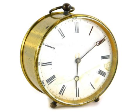 A late 19th/early 20thC French brass travelling timepiece, the circular dial with Roman numerals, stamped to the brass moveme