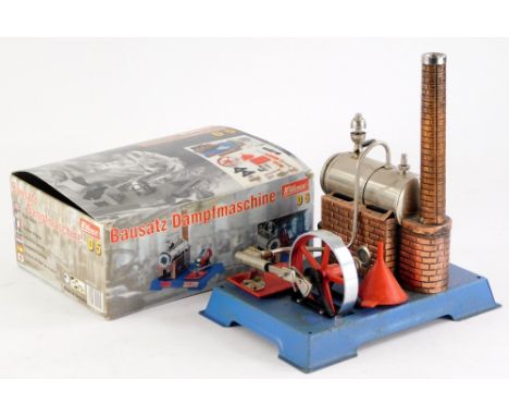 A Wilesco tin plate and metal static engine, in original box.