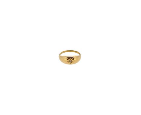 An 18ct gold diamond set ring,  width 7.9mm, misshapen shank, approximate size R, hallmarked 18ct gold, weight 2.7g