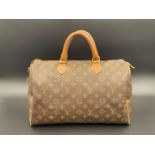 LOUIS VUITTON, Speedy 35, monogram canvas and stitched leather holdall,