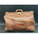 An early 20th century, large stitched leather “Gladstone” travel bag,