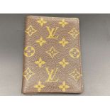 LOUIS VUITTON, a monogram, coated canvas and leather passport cover