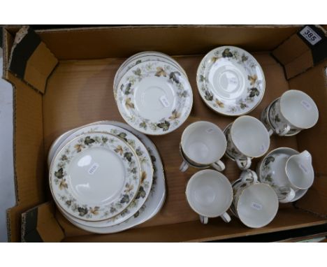 A collection of Royal Doulton Larchmont design teaware to include cups, saucers, side plates, serving platter etc 