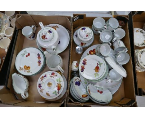 A large collection of Royal Worcester tea and dinner ware in the Evesham veil pattern to include coffee cups, tureens, servin