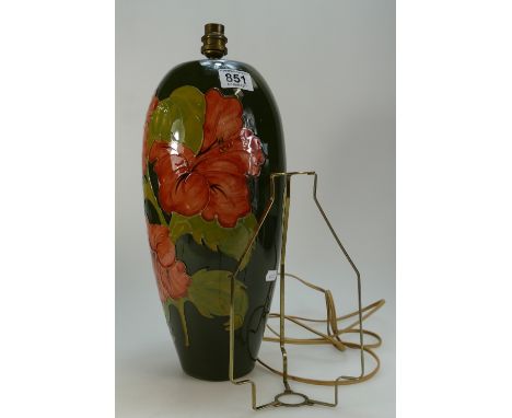 Moorcroft Hibiscus lamp base on green background height 42cm
