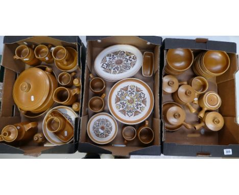 A large collection of Langley mid century dinnerware to include steak plates, dinner plates, fruit bowls, tureens, cups, sauc